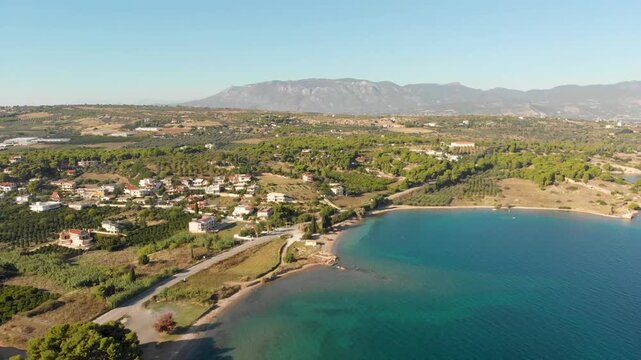 Aerial view of Beach Paralia Kechrion near Corinth Canal, Greece. Drone view from above. Summer holidays destination
