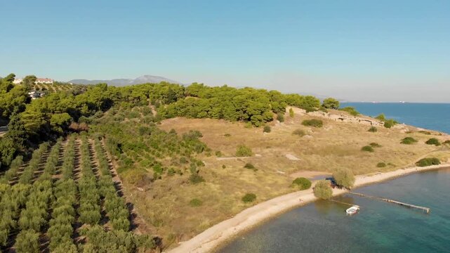 Aerial view of Beach Paralia Kechrion near Corinth Canal, Greece. Drone view from above. Summer holidays destination
