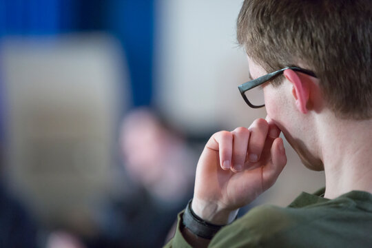 Young man with Cerebral Palsy and Nonverbal learning disorder in a meeting