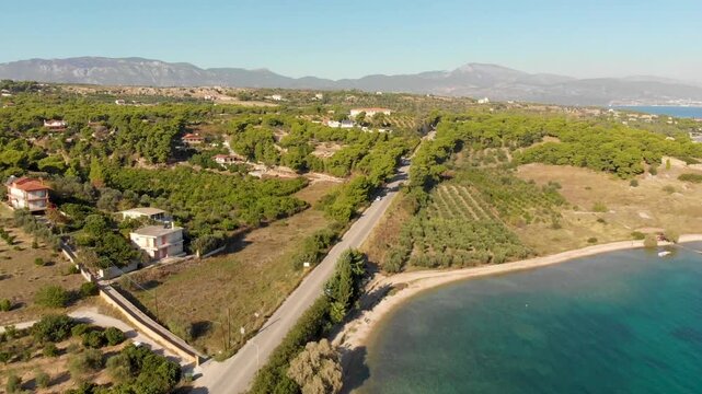 Aerial view of Beach Paralia Kechrion near Corinth Canal, Greece. Drone view from above. Summer holidays destination
