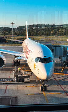 Zurich, Switzerland - May 29, 2025: Aircraft docked at Zurich Airport during the day with crew prepping for departure