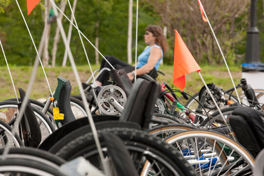 Accessible racing bikes and a woman with spinal cord injury in a wheelchair