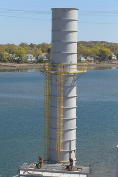 Exhaust stack with safely cage for electric plant