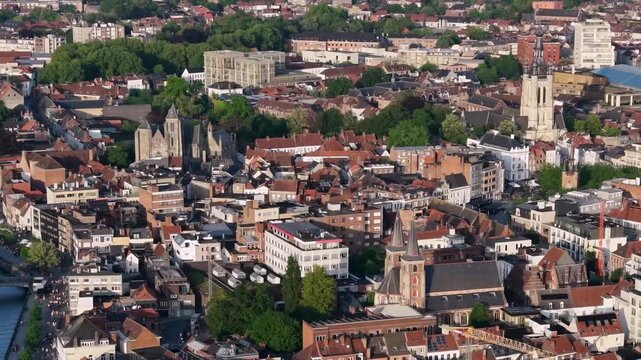 Aerial view beside the old town above the city Kortrijk in Belgium, on a sunny afternoon in early summer.