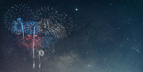 Obraz premium Red and Blue Fireworks on night background