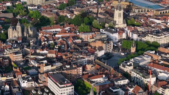 Aerial view beside the old town above the city Kortrijk in Belgium, on a sunny afternoon in early summer.