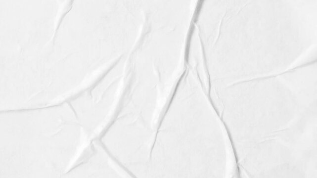 white crumpled and creased glued wrinkled paper poster texture background stop motion