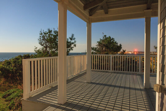 Vacation home deck under moonlight