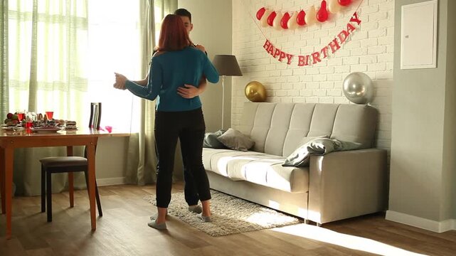 Mother and son dancing slow dance