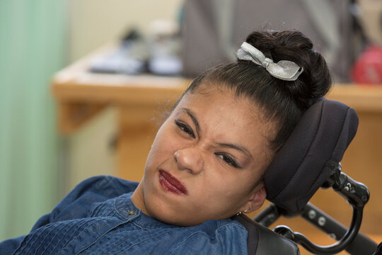 Teen with Spastic Dystonic Cerebral Palsy at school