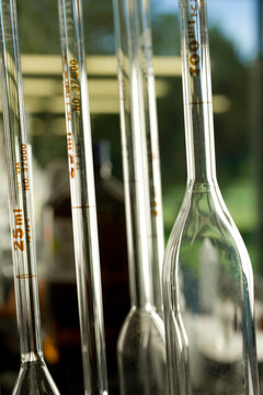 Glass beakers in laboratory, close-up