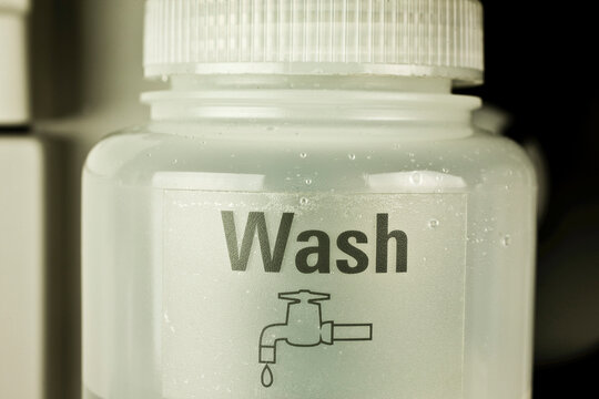 Wash collection vessel for atomic absorption autosampler