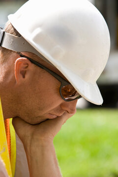 Tired construction worker, close-up