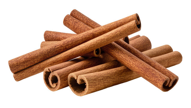 Pile of cinnamon sticks with rough texture and warm brown color