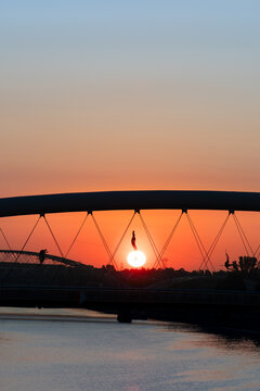 View of a bridge in Krakow at dawn in spring, Poland