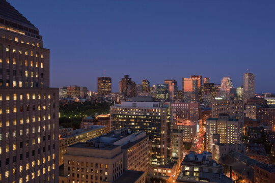 City lit up at dusk, Stuart Street, John Hancock Tower