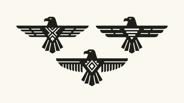 Set of three geometric eagle thunderbird icons with spread wings and tribal patterns