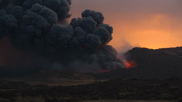 Erupting vent and plume sending ash, pulsing lava at twilight from pulses, lava field visible