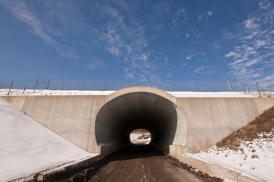 Tunnel underneath a highway at a construction site
