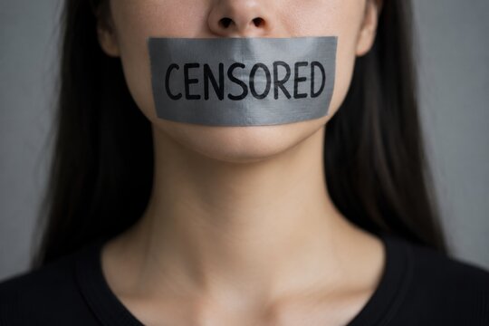 Woman with tape over mouth labeled censored. Concept of censorship, silencing voices, freedom of speech, suppression, discrimination and human rights