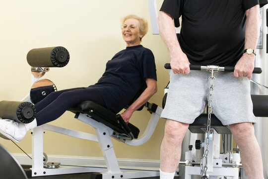 Senior couple exercising in the gym
