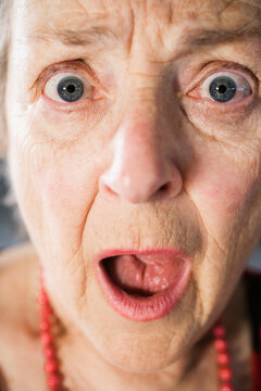 Portrait of a shocked senior woman