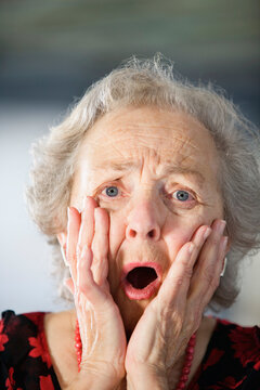 Portrait of a shocked senior woman