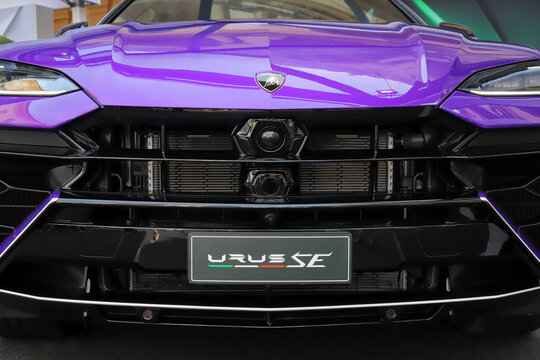 Modena, Italy, may 29 2026 - Motor Valley Fest 2026 public exhibition, Lamborghini Urus SE purple color, front side detail, luxury sports car