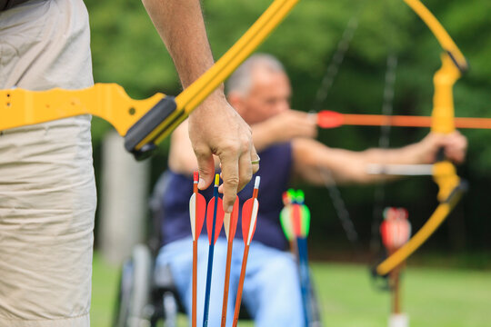 People with disabilities during archery practice