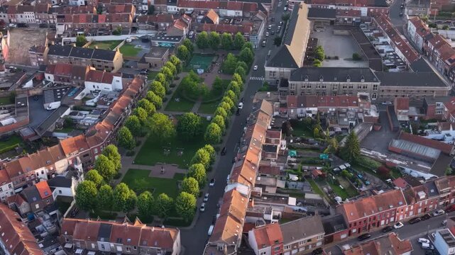 Aerial view beside the old town above the city Menen in Belgium, on a sunny afternoon in early summer.