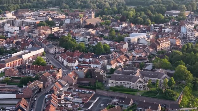 Aerial view beside the old town above the city Menen in Belgium, on a sunny afternoon in early summer.