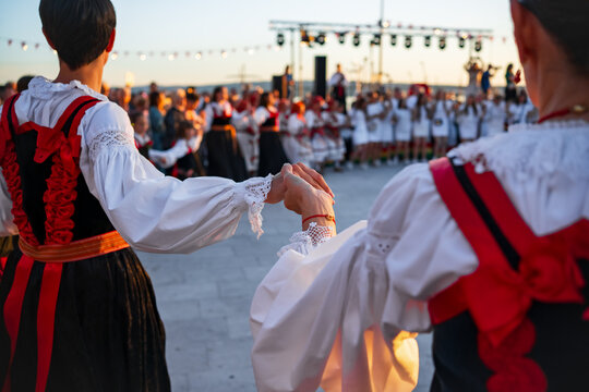 Folk performers in traditional Croatian costumes. SrEtno Selce festival 