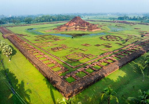 Aerial view of the ancient Sompur Mahavihara Buddhist monastery ruins with its central stupa and rectangular enclosure walls in Naogaon District, Rajshahi Division, Bangladesh.