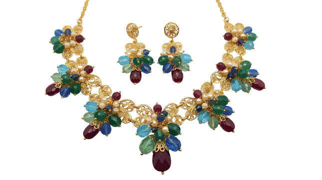 Ornate gold necklace and matching earrings with colorful gemstones