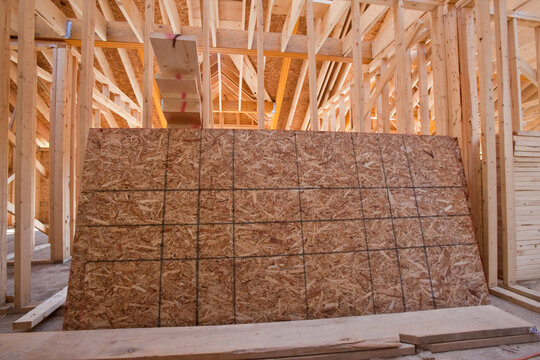 Roof sheathing in the upper floor of an under construction house