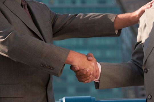 Businessmen shaking hands