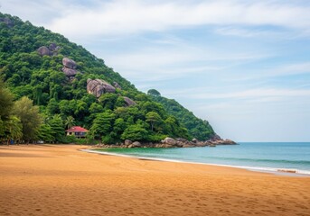 Fototapeta premium Beach landscape with tropical forest mountain and clear blue sky