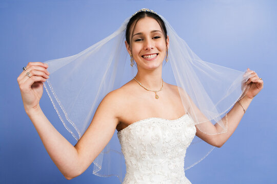 Portrait of young woman wearing wedding gown