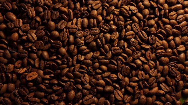 50p overhead slider shot moving across roasted coffee beans texture