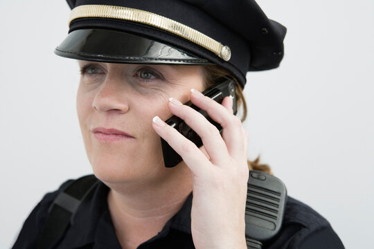 View of a police woman talking on the mobile phone