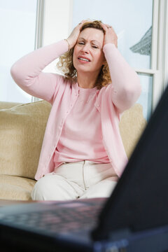 View of a mature woman expressing sadness