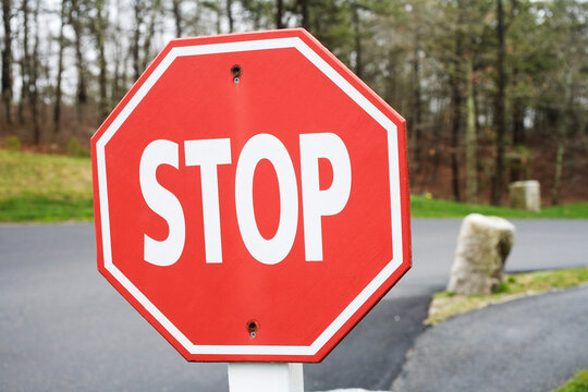 Stop sign displayed on the road