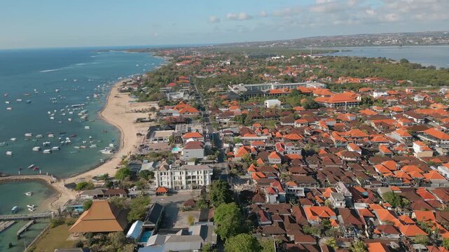 White Sand Bali Beach Benoa Uluwatu Clear Water And Houses Indonesia Drone Track Left 4K 30FPS