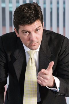 Portrait of a business man gesturing