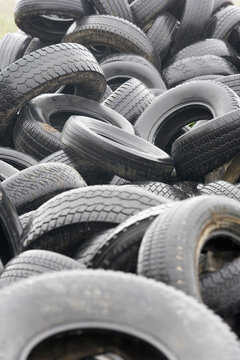 Piles of wet rubber tires