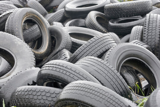 Piles of wet rubber tires