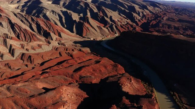 Tilt up of Raplee Ridge from an aerial drone perspective in southeastern Utah.