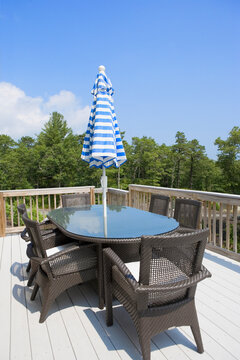 Dining table and chairs on a deck