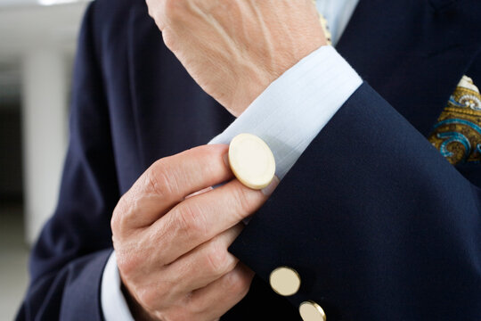 Close up of a man wearing cufflink