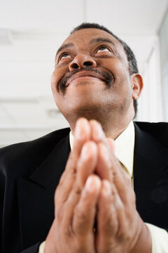 Close up of a man praying